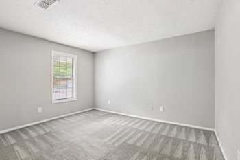 Plush wall-to-wall carpeting in bedrooms